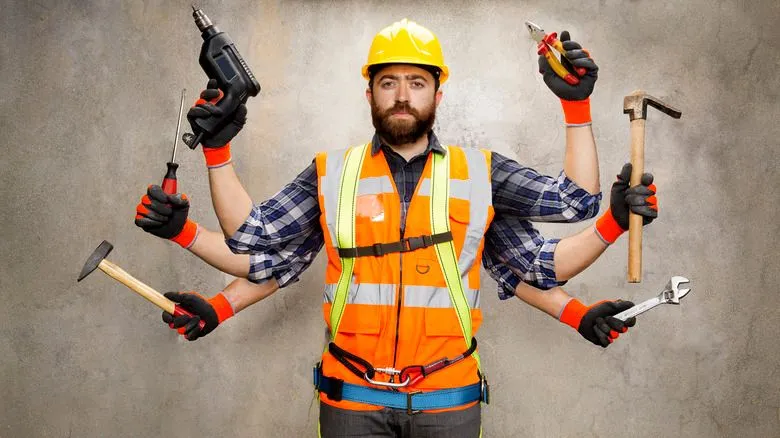A construction worker with multiple arms holding various tools.